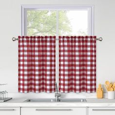 red and white checkered kitchen curtains hanging on the window