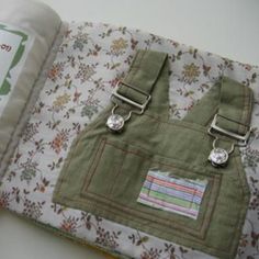 the book is open to show an apron