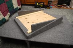 the bed frame is made out of wood and felt