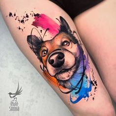 a dog's head with colorful paint splatters on it