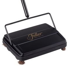 a black floor sweeper with the word filler on it's side and handle