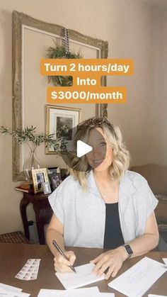 a woman sitting at a table with papers and pen in front of her face that says turn 2 hours / day into $ 300 / month