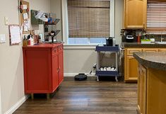 the kitchen is clean and ready to be used for cooking or cleaning up in the house