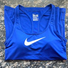 This Beautiful Deep Blue Nike Tank Is Perfect For Any Workout! Brand New, Never Worn/Used. Nike Tank, Blue Nike, Nike Blue, Nike Tops, Shirt Color, Deep Blue, Workout Shirts, Nike Women, Colorful Shirts