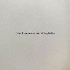 a white wall with the words your kisses make everything better