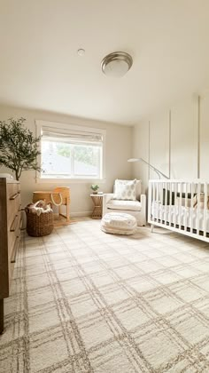 a baby's room with a crib, dresser and bed