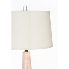 a table lamp with a white shade on it