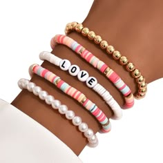 PRICES MAY VARY. 💝 Adopting love letters design, the bracelet is cute and meaning. And the colorful style is very beautiful. The faux pearls style bracelet will makes you look more temperament. 💝 Bohemian bracelets set features handmade and lightweight, they are very comfortable to wear. 💝 Made of high quality polymer clay material, the bracelet is wear-resistant and durable. 💝 The diameter of the bracelet is about 8cm. 💝 It is suitable for anniversary gifts, birthday gifts or daily wear, p Multicolor Bracelet, Preppy Bracelets, Preppy Jewelry, Polymer Clay Bracelet, Faux Pearl Bracelet, Clay Bracelet, Diy Bracelet Designs, Letter Bracelet, Beads Bracelet Design