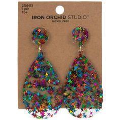 pair of earrings with multicolored stars on the front and back of each ear