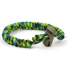 a bracelet that has a metal clasp on the end and is made out of multicolored fabric