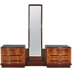 a wooden dresser with two drawers and a mirror