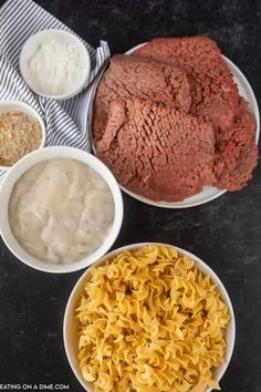 three bowls filled with different types of food on top of a black counter next to each other