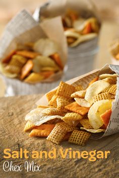 a bag full of cheesy crackers sitting on top of a wooden table