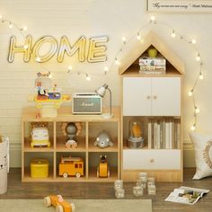 a child's room with toys and lights on the wall, including a bookcase