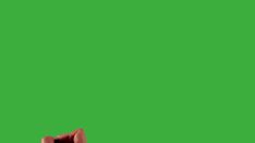 a person is holding a cell phone in front of a green screen