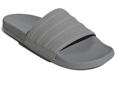 adidas Adilette Comfort - Shoes : Solid Grey/Solid Grey/Solid Grey : Get a little style with your poolside comfort thanks to these adidas Adilette Comfort Slides. They feature a lightweight EVA build and a contoured footbed for elevated cushioning. The single-bandage upper is finished with classic-look 3-Stripes. QUICK-DRY UPPER: Single-bandage EVA upper dries fast. Textile lining. CONTOURED FOOTBED: Contoured footbed for easy wear. Classic slides with modern style for everyday wear. SLIP THEM ON: Slip-on upper for easy on and off. Open, round toe silhouette. CUSHIONED FEEL: EVA outsole for lightweight cushioning. Imported. Measurements: Weight: 7 oz Product measurements were taken using size Men's 9, Women's 10, width Medium. Please note that measurements may vary by size. Comfort Gray, Adidas Adilette, Comfort Shoes, Easy Wear, Product Reviews, Comfortable Shoes, Classic Looks, Quick Dry, Modern Style