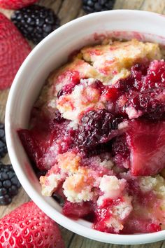 a close up of a bowl of food with berries