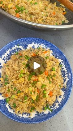 two plates filled with rice and vegetables next to each other