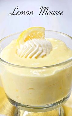 a lemon mousse in a glass bowl on a table