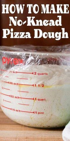 the ingredients for no - knead pizza dough in a measuring cup