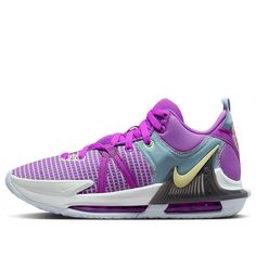 the nike air zoom low is available in purple and white, with metallic accents on the upper