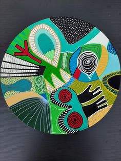 a colorful plate with abstract designs on it