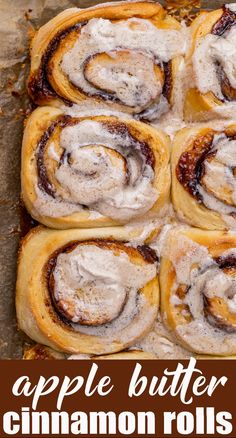 apple butter cinnamon rolls on a baking sheet with text overlay that reads, apple butter cinnamon rolls