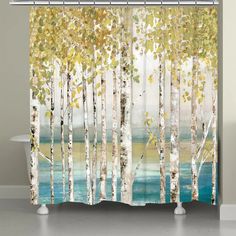 a shower curtain with trees and water in the background, on a white bath tub