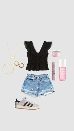 a black top, denim shorts and sneakers