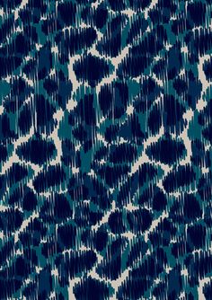 a blue and white animal print fabric