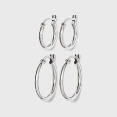 A classic pair of hoop earrings is a must-have in every jewelry collection — this Sterling Silver Click-In Hoop Earring Set is the perfect addition to your style. The versatile set of earrings includes a pair of small hoop earrings and a pair of medium hoop earrings, perfect for every occasion. Wear them together or solo for a classic style. Gender: female. Age Group: adult. Pattern: Solid. Hoop Earring Set, Cubic Zirconia Hoop Earrings, Medium Hoop Earrings, Bloxburg Ideas, Small Hoop Earrings, Hoop Earring Sets, Large Hoop Earrings, Sterling Silver Hoop Earrings, Accessories Jewelry Earrings