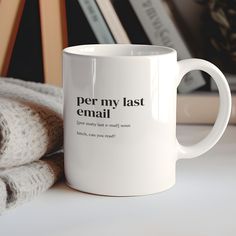 a white coffee mug with the words per my last email on it