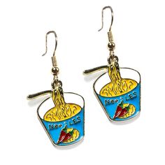 Send Noods! These delightful earrings are lightweight and measure 3/4 an inch. They are detailed with a little bowl filled with Ramen noodles, a spoon, and a hot pepper design. Earrings are nickel and lead-free. Outlined in gold, with yellow and blue enamel . We understand online shopping can be difficult. It's sometimes hard to get a true idea of the product online from a limited number of pictures. Please let us know if you have any questions, or would like to see more pictures. We want you to Cup O Noodles, Spoon Earrings, Send Noods, Noodles Ramen, Hot Pepper, Ramen Noodles, Hard To Get, Ramen, Noodles