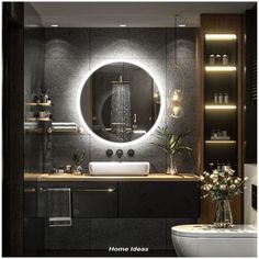 a bathroom with a round mirror above the sink and lights on the wall behind it