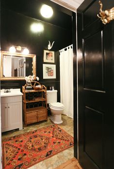 Brighten Bathroom, Small Dark Bathroom, Windowless Bathroom, Moore House, Dark Bathrooms, Eclectic Bathroom, Frameless Shower Doors, Dark Walls, Vintage Bathrooms