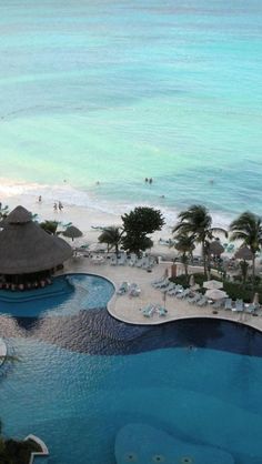 an aerial view of the pool and beach at dreams resort in cancucilla, mexico