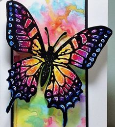 a card with a colorful butterfly on it