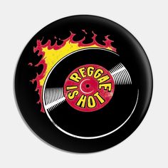 a black record with flames on it and the words reggae shop written in yellow letters