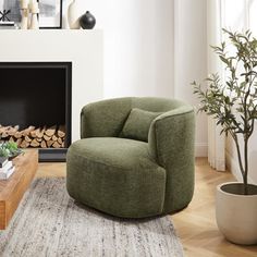 a living room with a fire place and a green chair