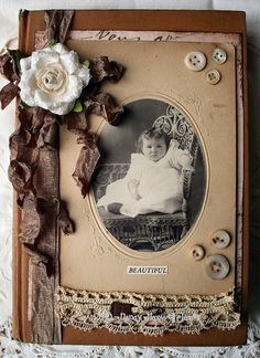 an old fashioned photo frame with flowers on it