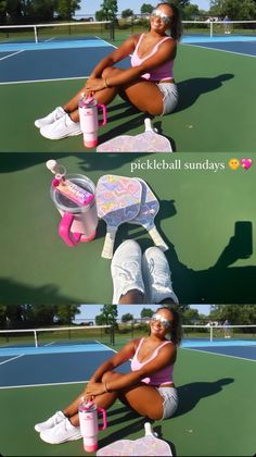 a woman sitting on top of a tennis court next to a pink cup and drink