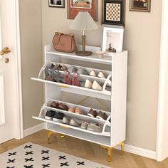 a white shoe rack with several pairs of shoes on it