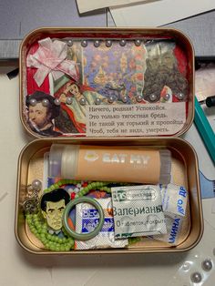 two tins filled with different types of items