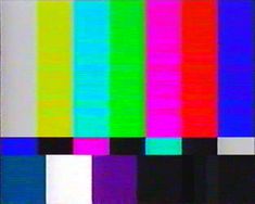 an old tv with no signal on it's color bars are shown in red, green, blue, and yellow