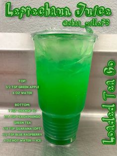 a green drink in a plastic cup with ice on the rim and text that reads leprechan juice ohh mist?