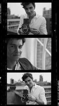 black and white photograph of three men taking pictures