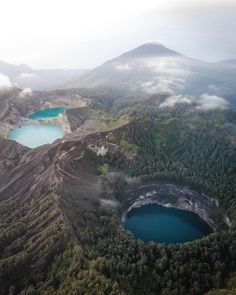 an aerial view of some mountains and lakes