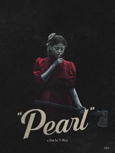 a woman in a red dress holding a black object with the words pearl on it