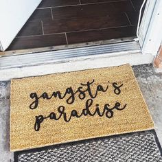 a door mat that says, san jose's paradise on the side of a house