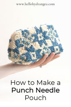 a hand holding a blue and white crocheted purse with text overlay reading how to make a punch needle pouch